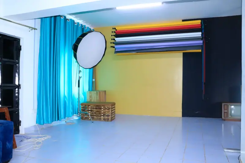 Inside the Kwanza Images photography studio in Njoro with professional lighting and backdrops
